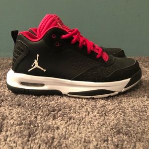 Pink, black, and white Jordan’s